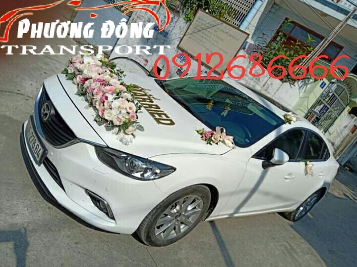 Cho thuê xe cưới màu trắng mazda 6 tại đường hai bà trưng quận hoàn kiếm hà nội